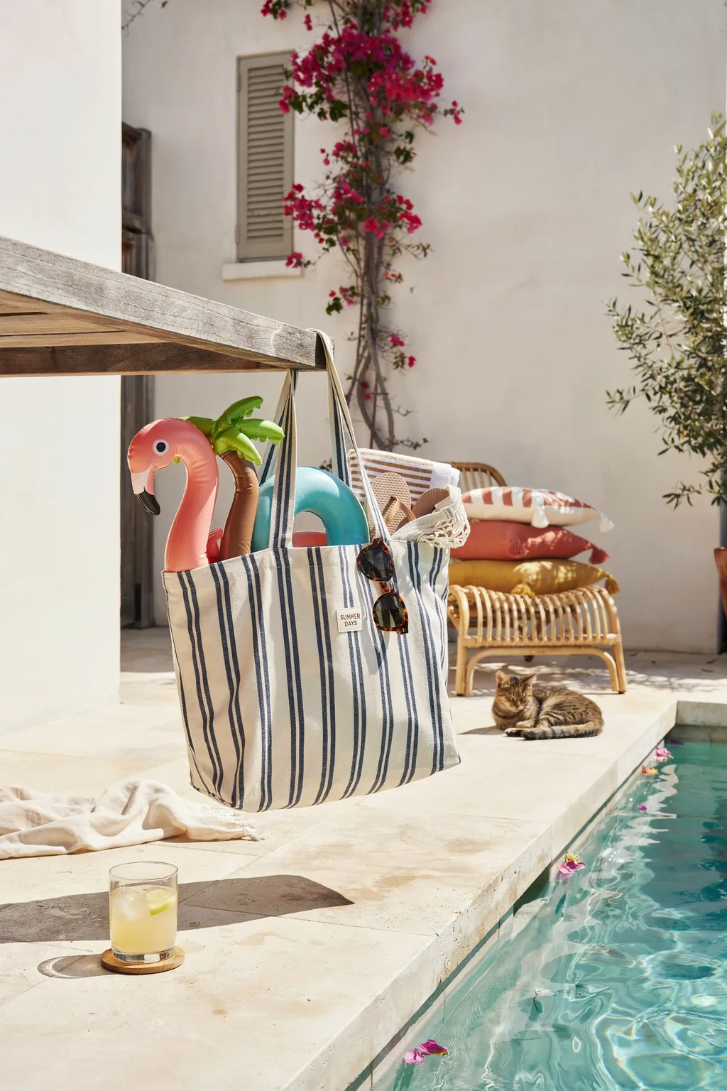 A Canvas Tote Hung from a Deck Railing