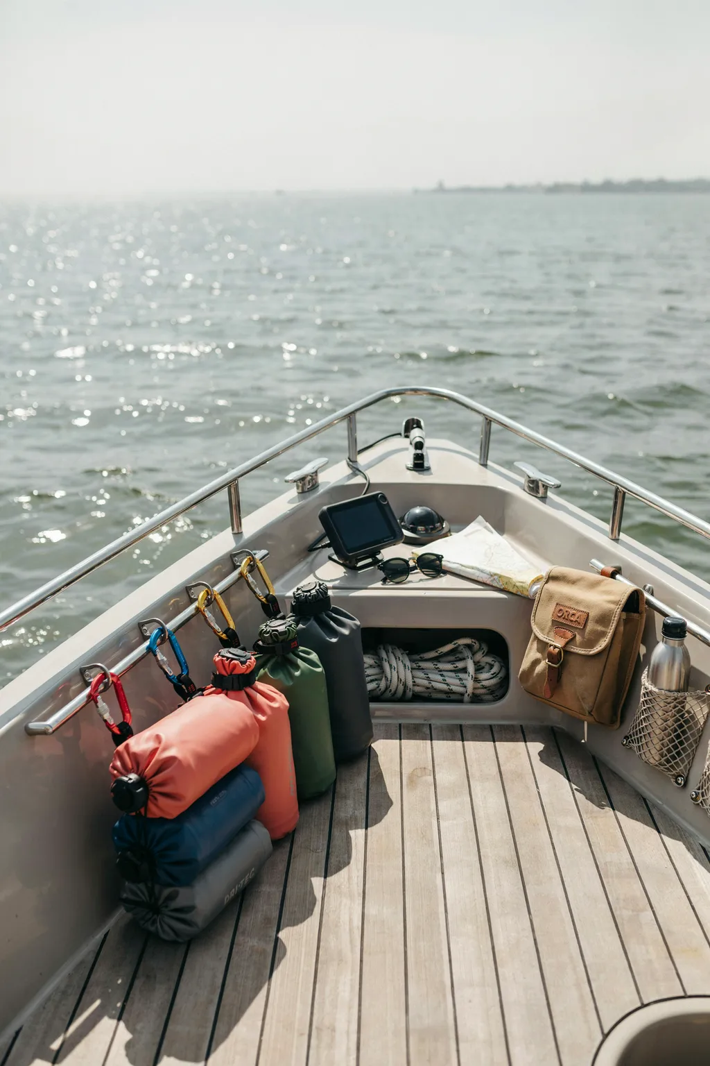 Use Carabiner Clips to Keep Gear Off the Deck