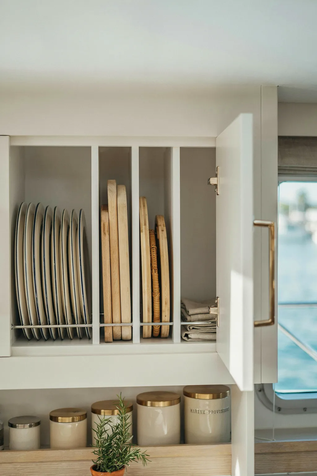 Use Tension Rods to Create Shelf Dividers