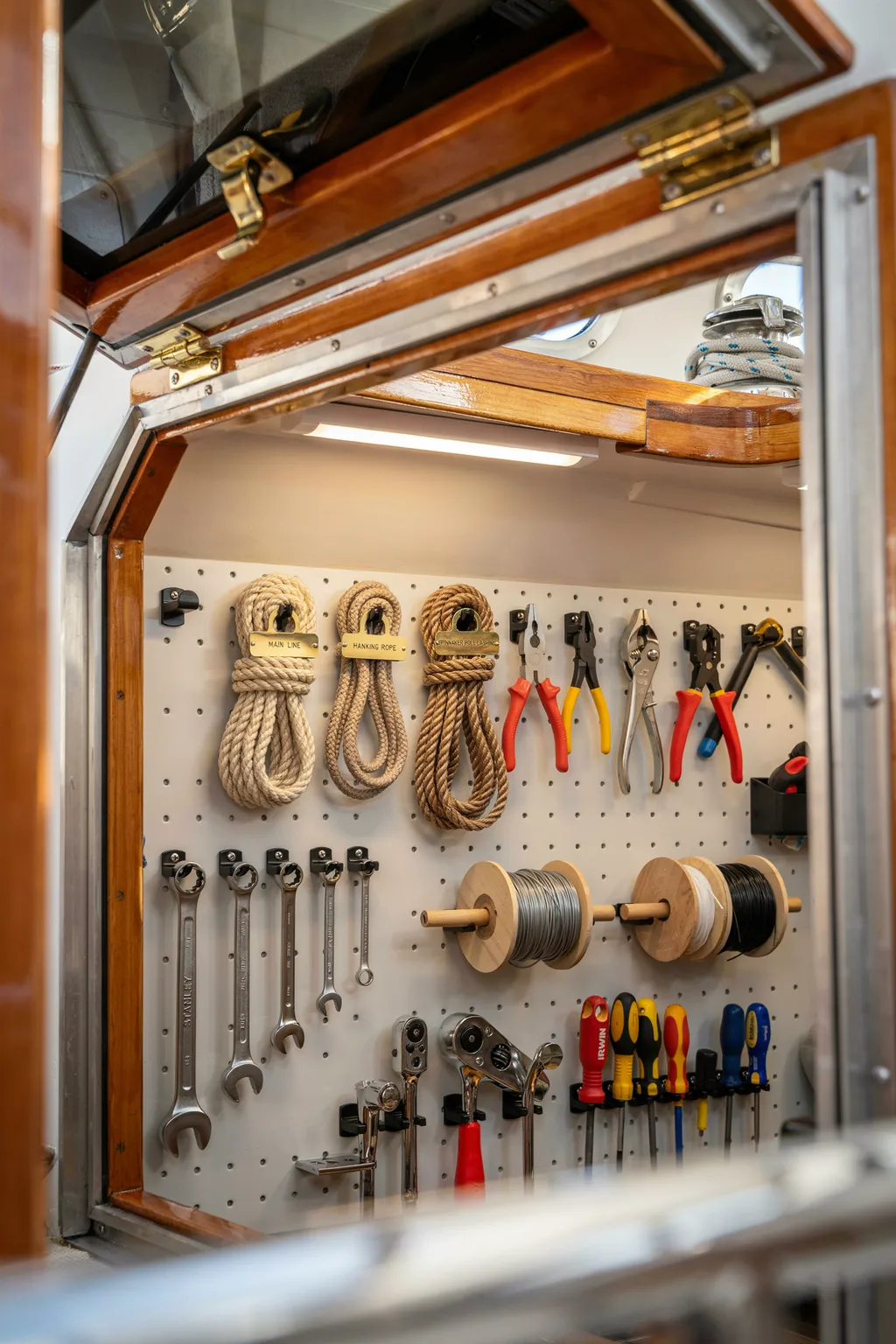 Use a Pegboard Inside a Large Storage Hatch